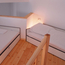The apartments on campus are mini-lofts, with the sleeping area on a higher upstairs level (3 - 5 beds per apartment)